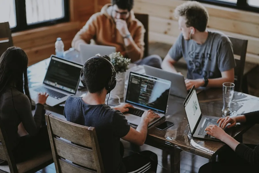Team collaborating at a shared workspace